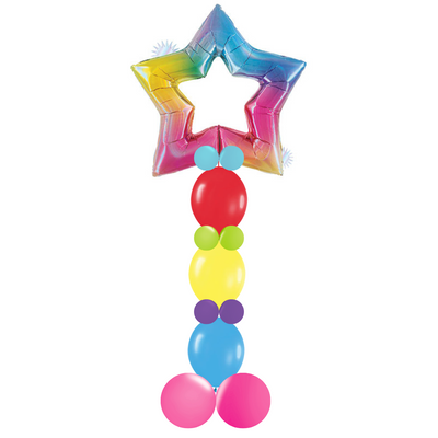 This colorful or monochromatic star topped column is a fun way to spruce up any surprise party or to just fill a corner at the next school dance.  Rainbow star on rainbow balloon column.