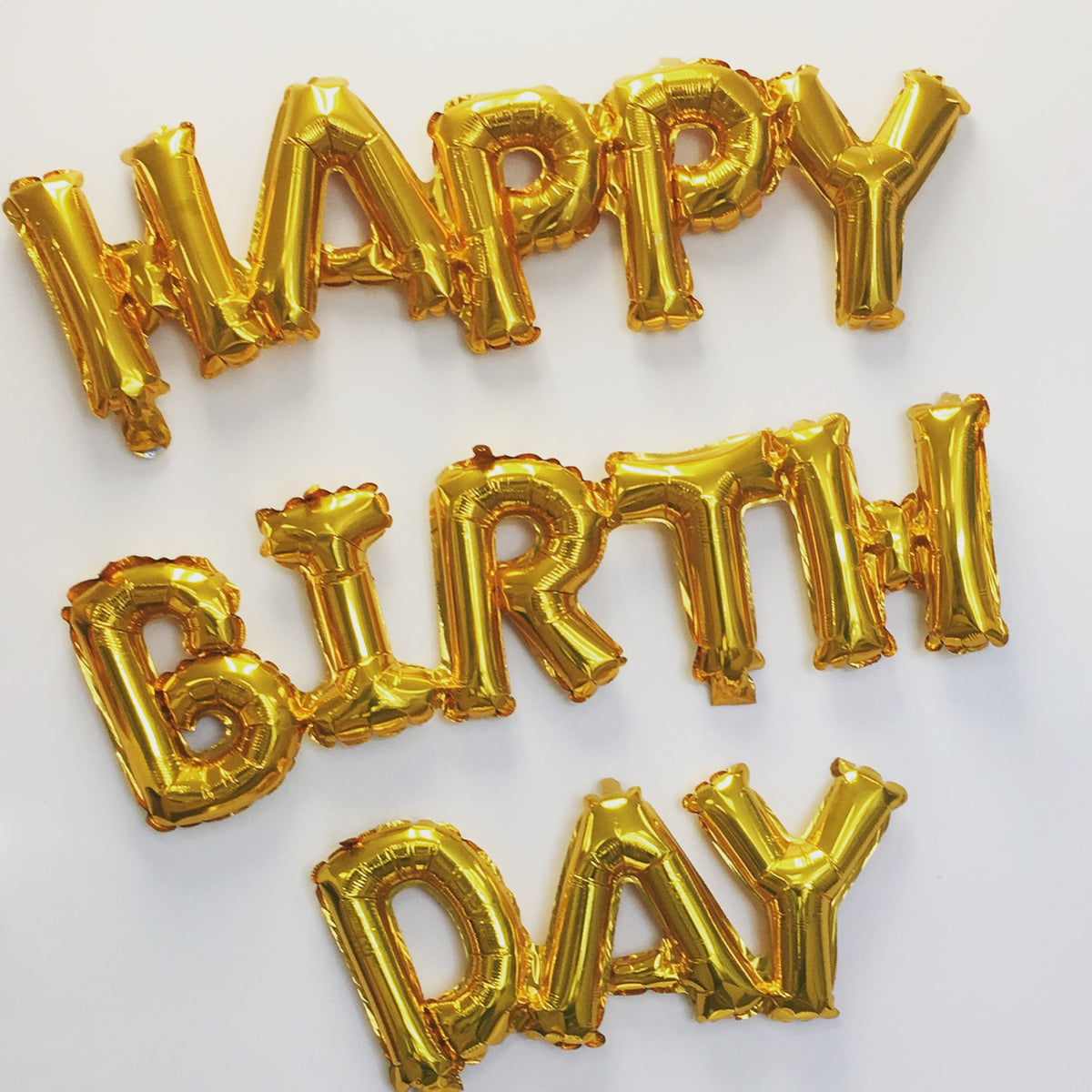 Non-Floating, Air-Filled Gold Phrase Happy Birthday Foil Balloon Banner
